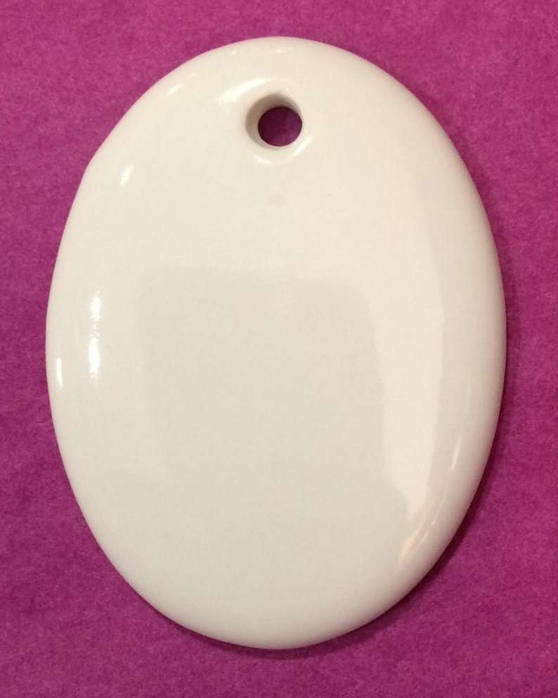 Pendentif ovale petit modèle en porcelaine à personnaliser